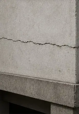 Long horizontal crack across a wall